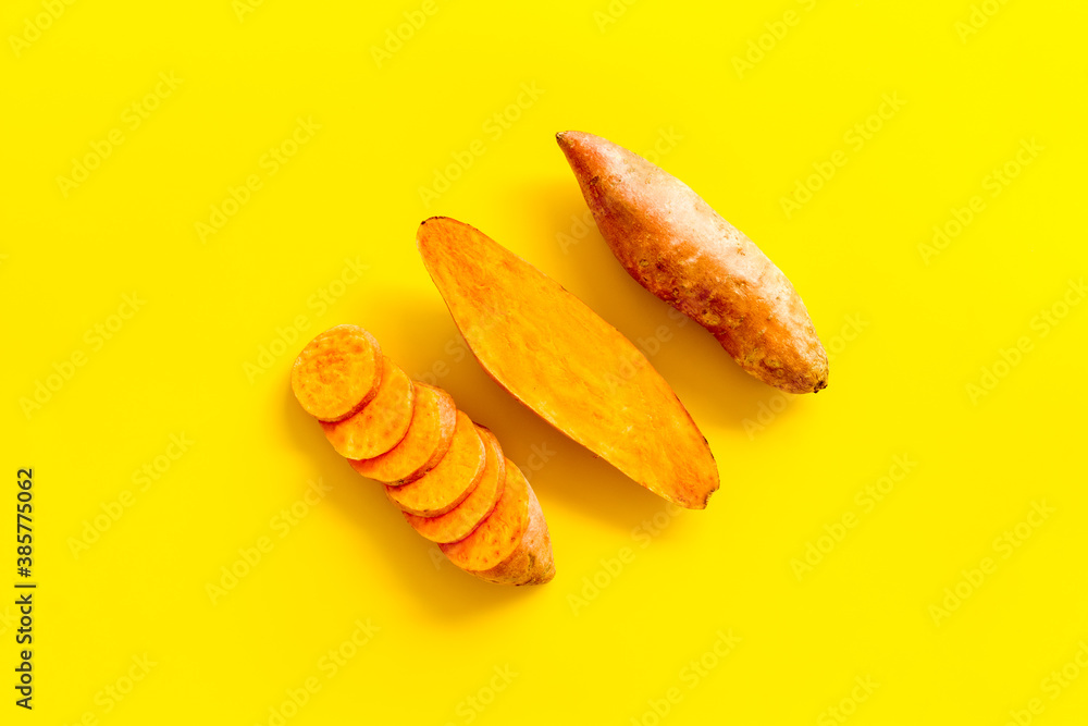 Sliced sweet potato on kitchet table, top view