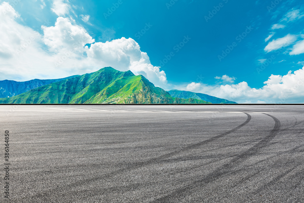 Race track and mountain with sky cloud natural scenery.