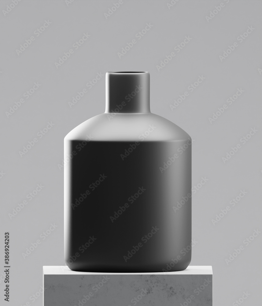 Black vase on cement table