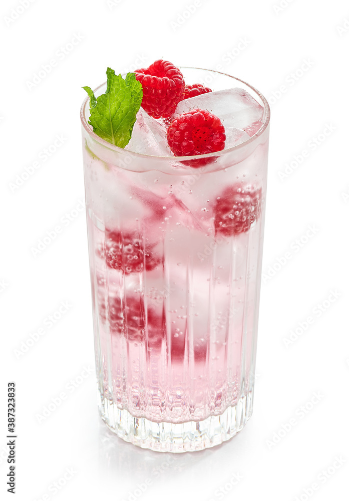 glass of iced drink with fresh raspberries