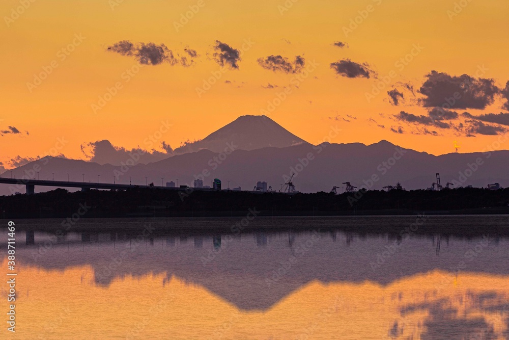 Mount Fuji and the reflection in the water after sunset
