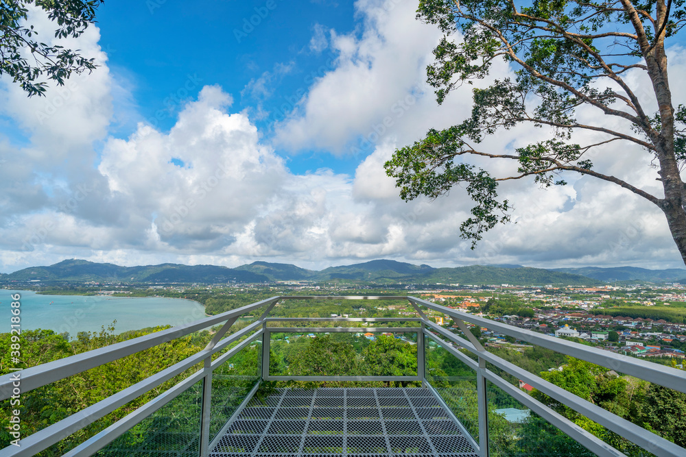 Terrace with a beautiful landscape scenery view of Tropical sea and mountain blue sky white clouds i