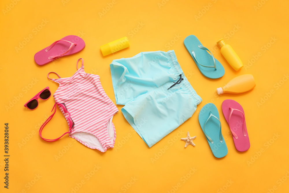 彩色背景儿童泳衣沙滩配饰套装