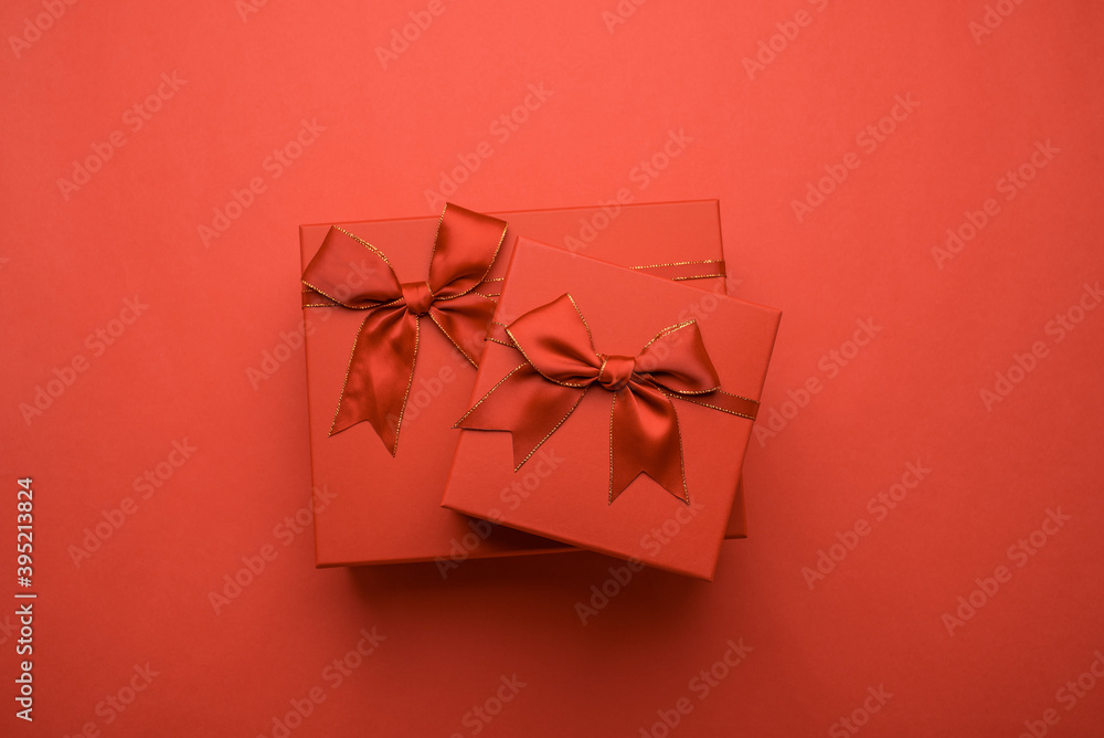 Exquisite gift box on red background