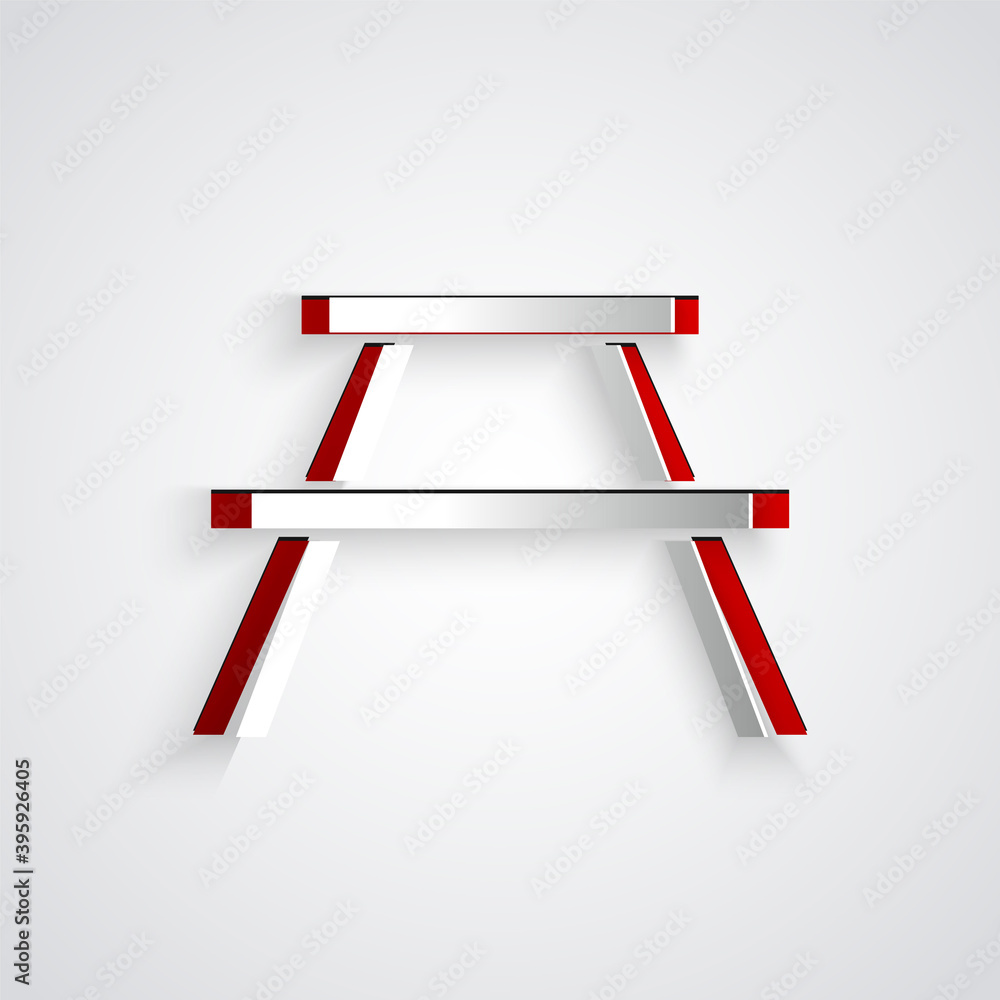 剪纸野餐桌，桌子两侧有长椅，灰色背景上的图标被隔离。Pa