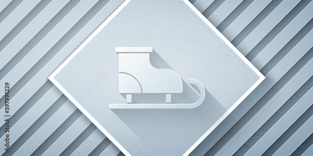 灰色背景上孤立的剪纸人物冰鞋图标。冰鞋图标，带bla的运动靴