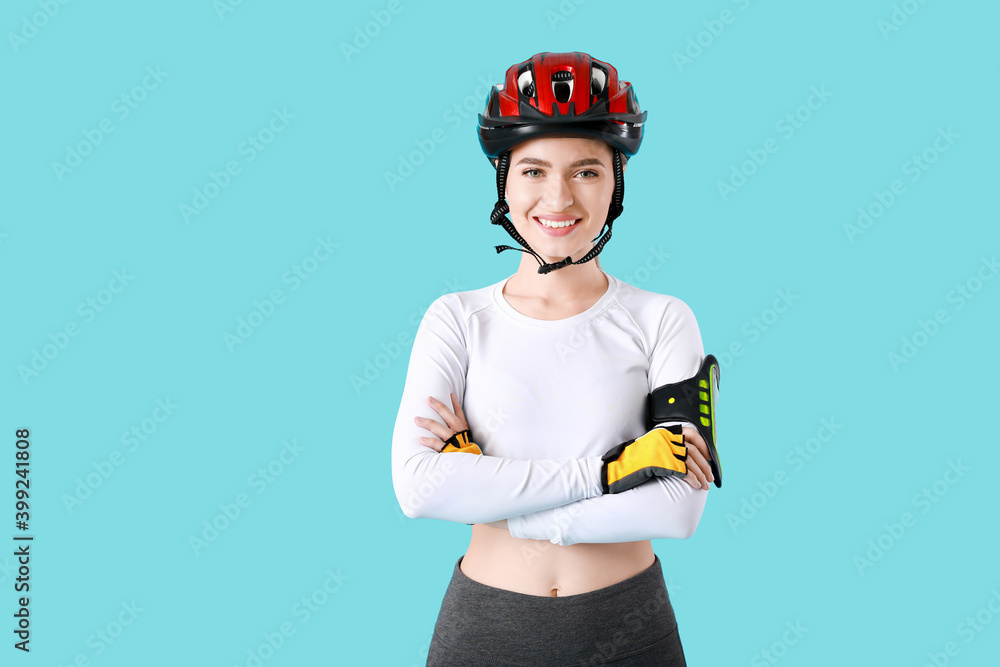 彩色背景下的女自行车手