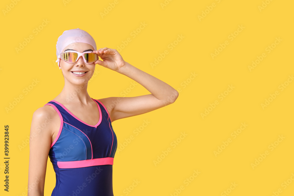 彩色背景的女游泳运动员
