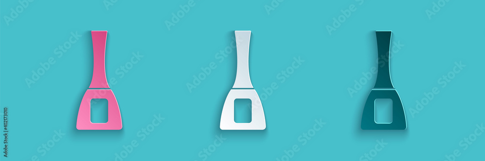 Paper cut Nail polish bottle icon isolated on blue background. Paper art style. Vector.