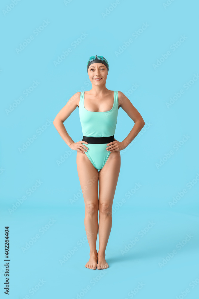 彩色背景下的女游泳运动员
