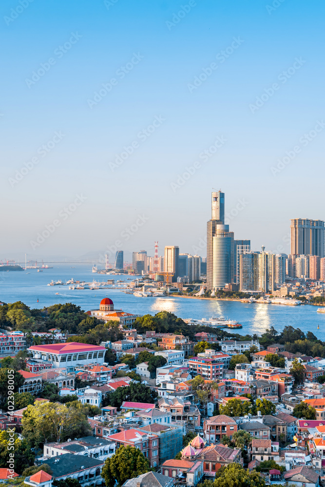 Sunny scenery of twin towers and Gulangyu in Xiamen, Fujian, China