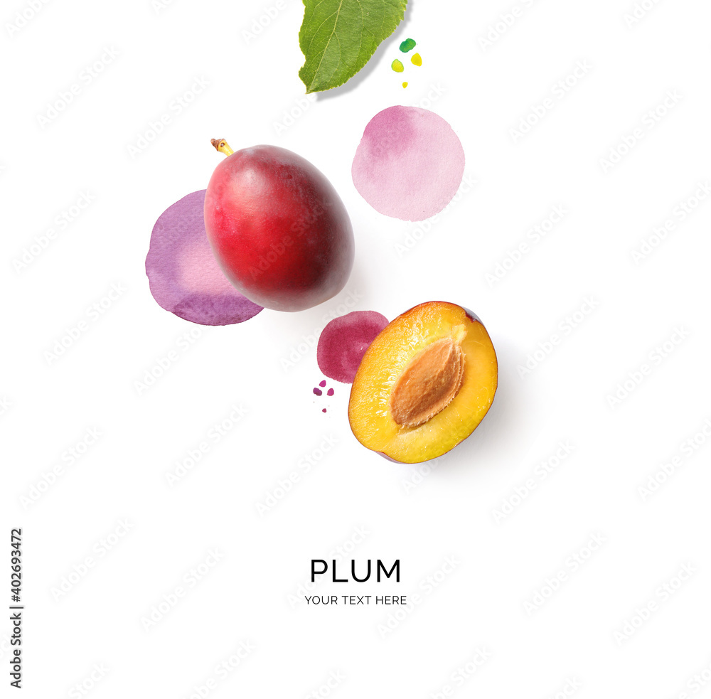 Creative layout made of plum on the watercolor background. Flat lay. Food concept.