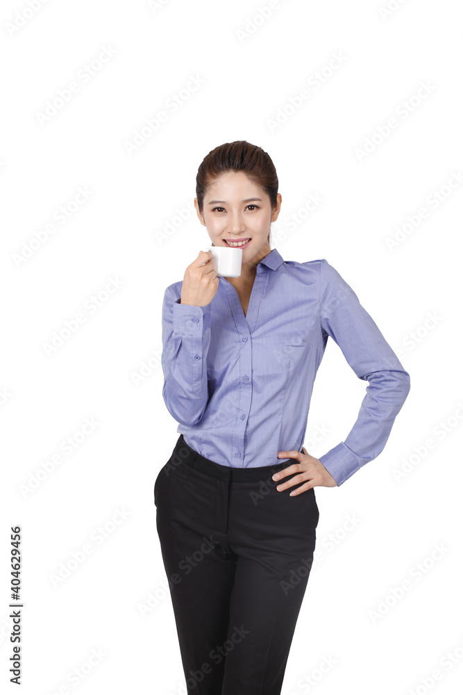 A happy young Business woman drinking coffee