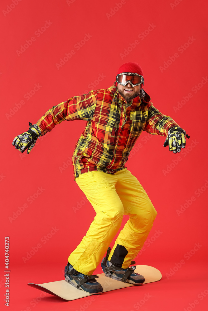 彩色背景的男单板滑雪运动员