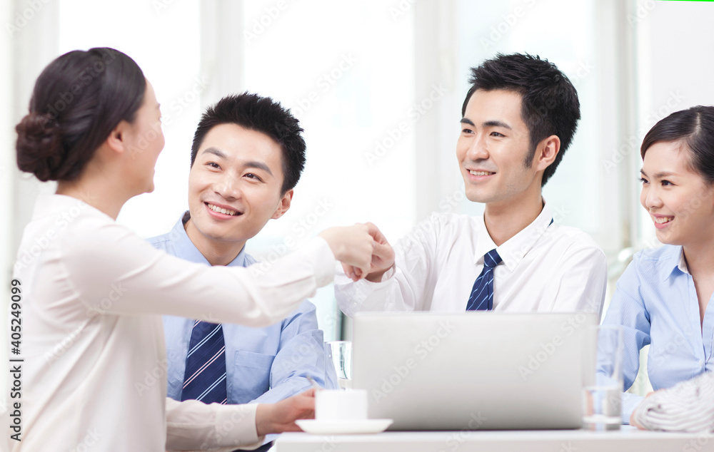 Young Business men shaking hands at office