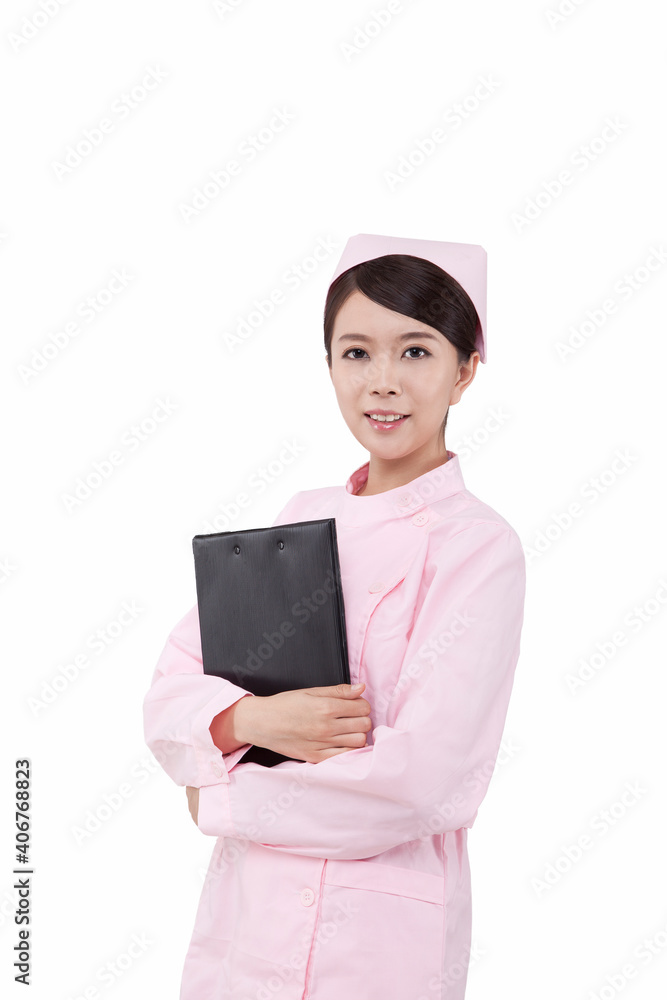 Portrait of a female nurse holding register 