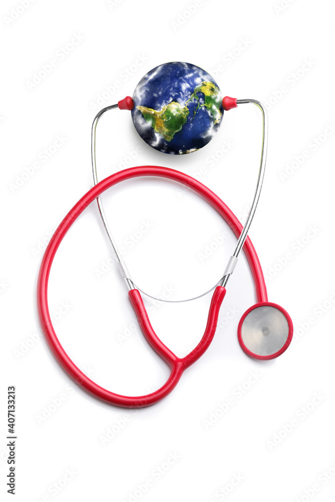 Stethoscope and model of Earth on white background. Ecology concept