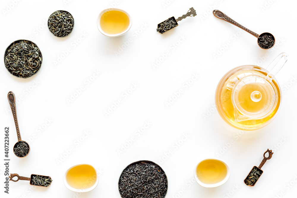 Frame of hot and dry tea in teapot and cups. Tea ceremony concept