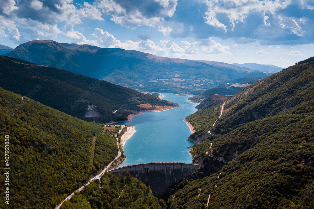 Italy - aerial view of Lake Fiastra with its dam in the Province of Macerata in the Marche region