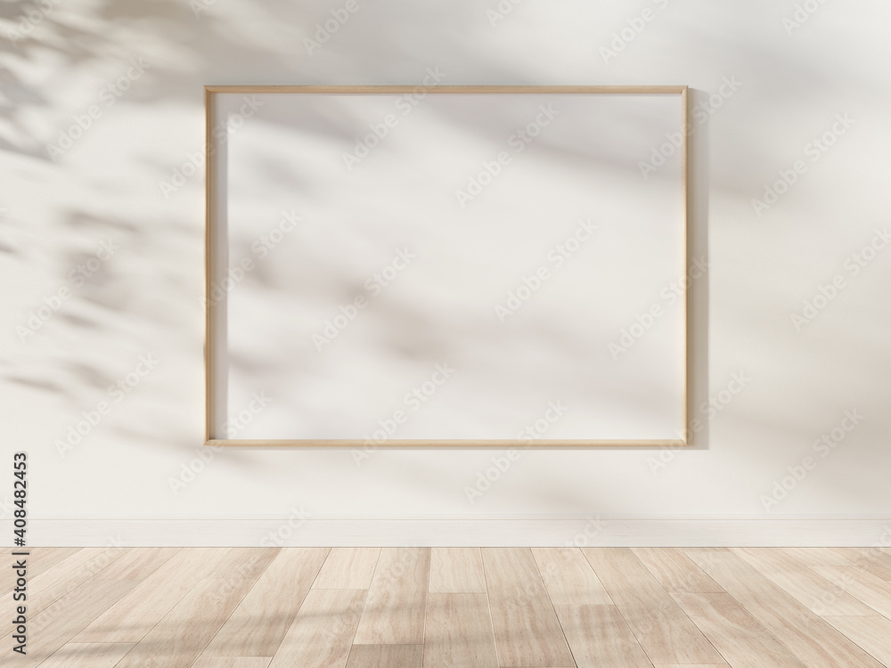 木框架悬挂在明亮的室内模型中。墙上相框的模板3D渲染