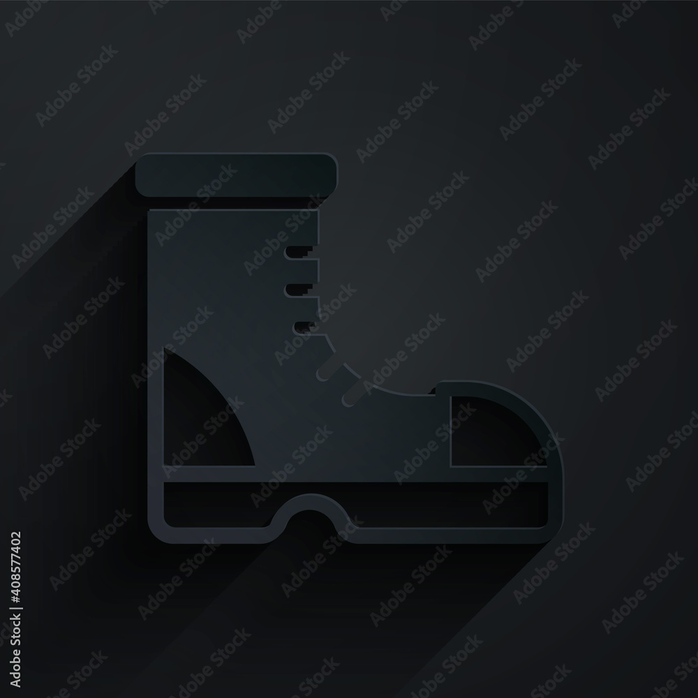 Paper cut Hunter boots icon isolated on black background. Paper art style. Vector.
