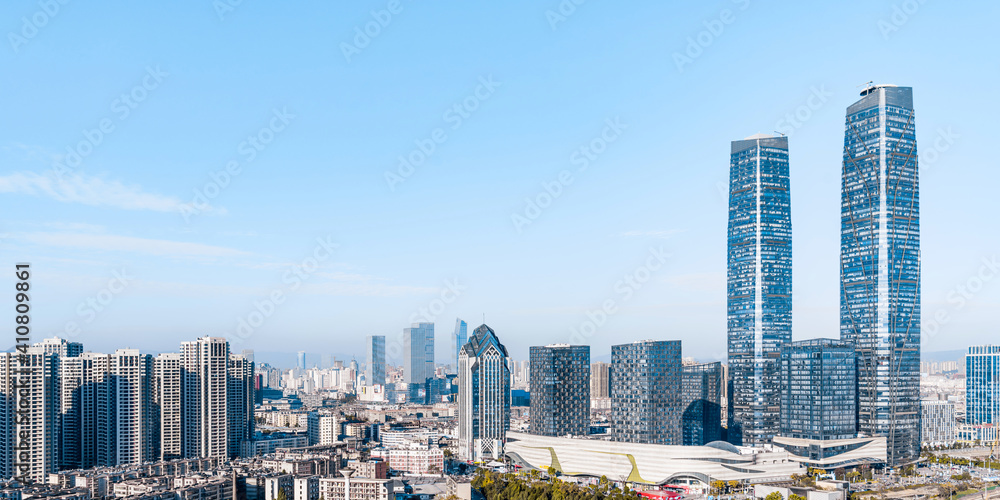 Sunny view of Kunming twin towers and city skyline in Yunnan, China 