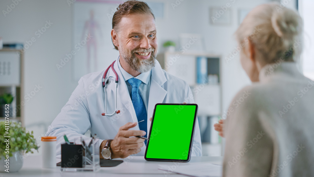 Family Medical Doctor is Explaining Diagnosis to a Patient on a Tablet with Green Screen in a Health