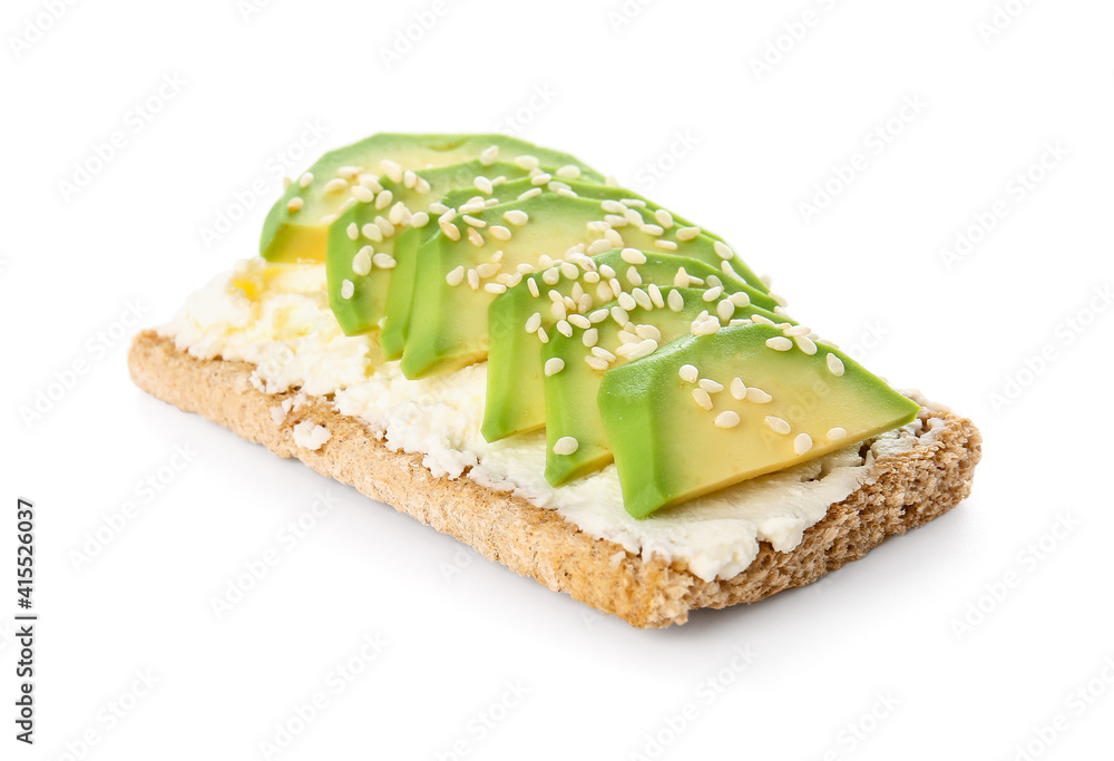 Crispbread with tasty cream cheese and avocado on white background