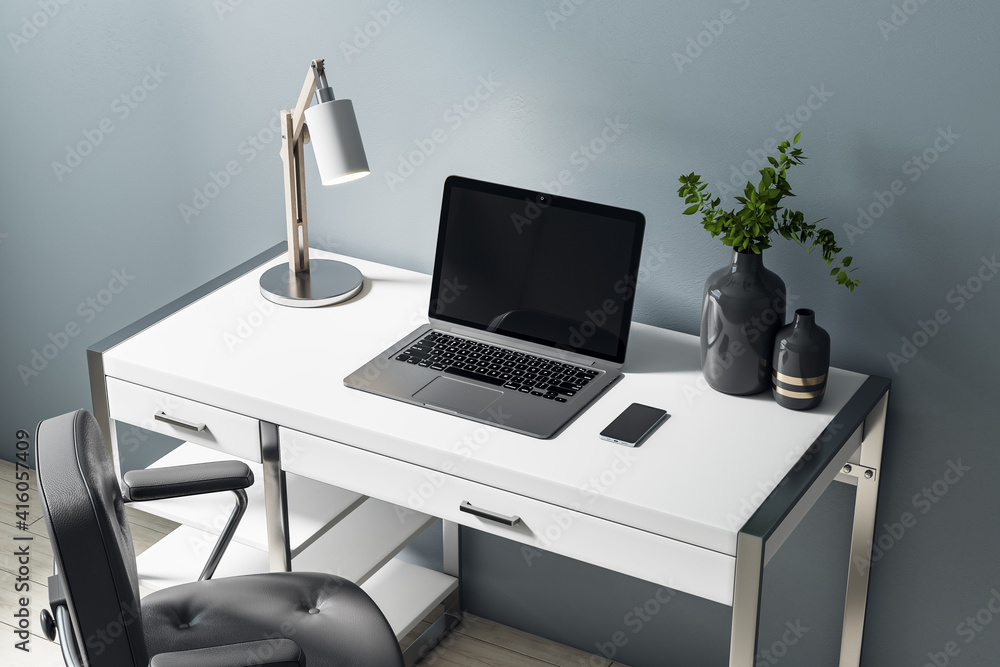现代家庭办公场所，配有白色时尚的家具、皮椅和纯黑笔记本电脑
