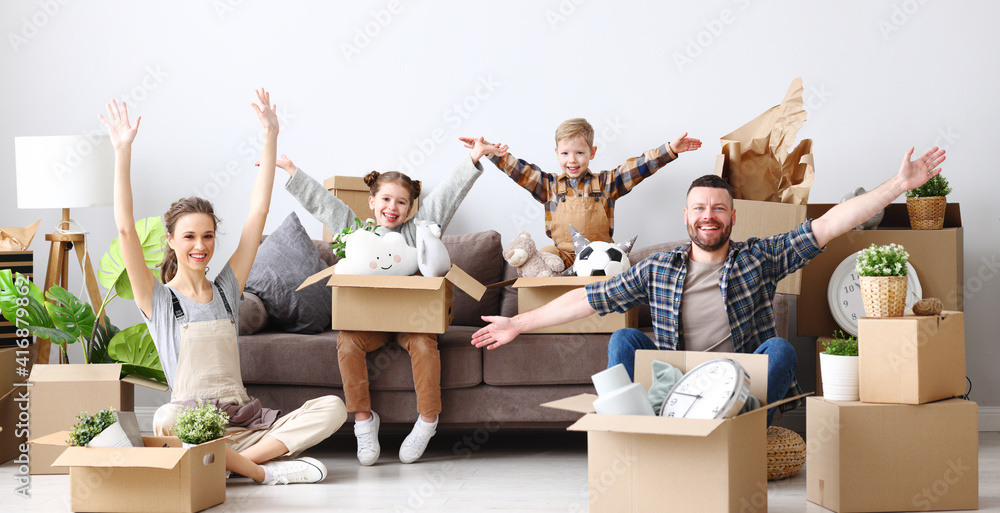 Cheerful family sitting of sofa in new apartment