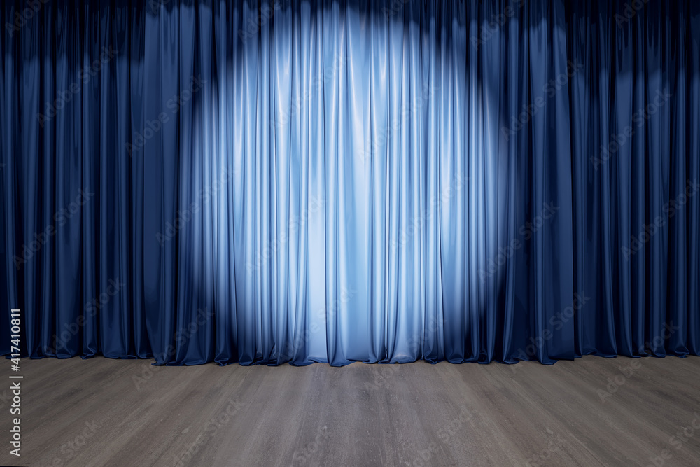 木地板舞台上蓝色窗帘上的圆形聚光灯