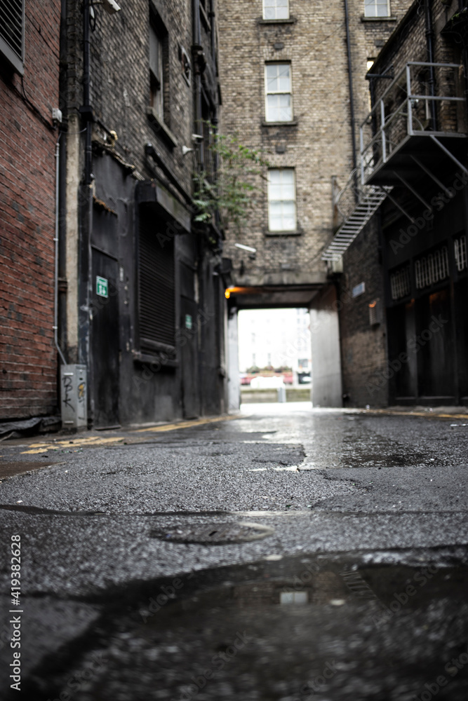 Dark and rainy alley in Dublin, Ireland.