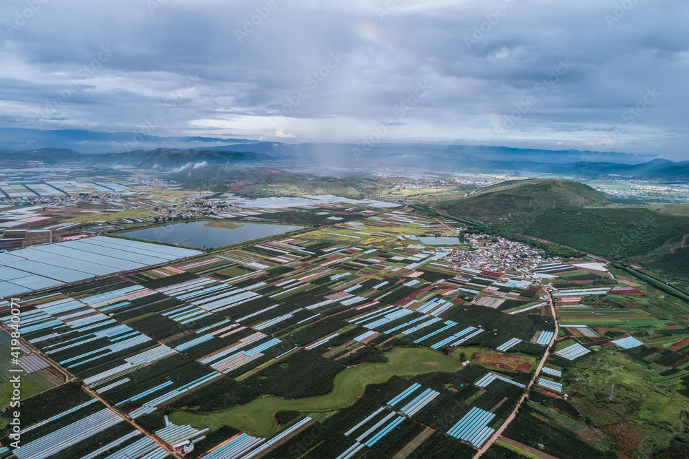 aerial view of agricultural plots of land under cultivation in an agricultural town. Mengzi, Yunnan 