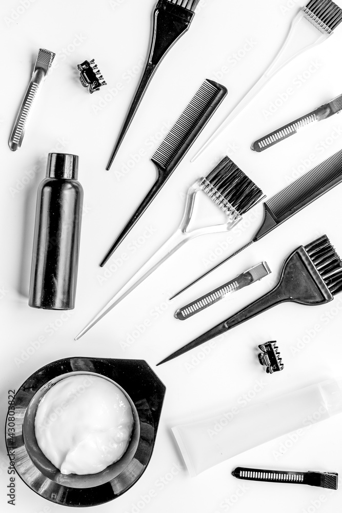 hairdresser woorking desk with tools on white background top view