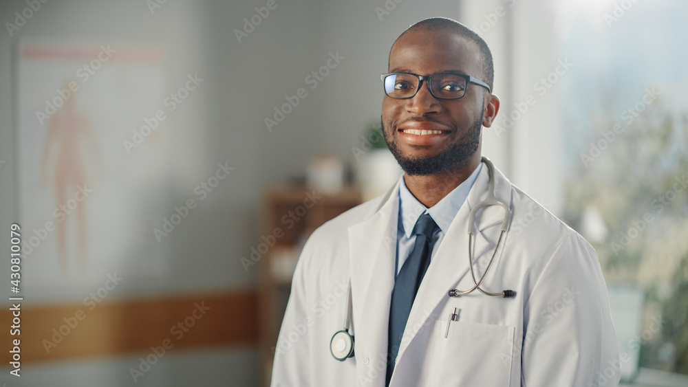 Close Up Portrait of Happy African American Family Medical Doctor in Glasses in Health Clinic. Succe
