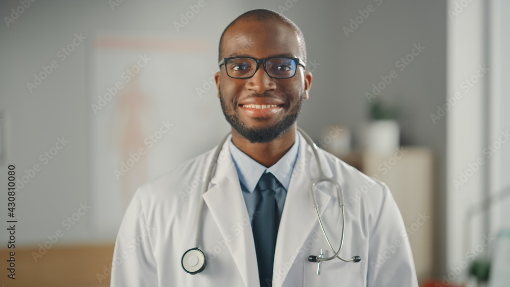 Close Up Portrait of Happy African American Family Medical Doctor in Glasses in Health Clinic. Succe