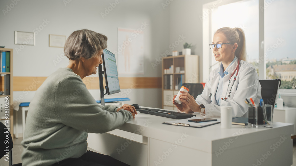 Female Family Doctor is Prescribing Drugs for Senior Patient and Speaking with Her During Consultati