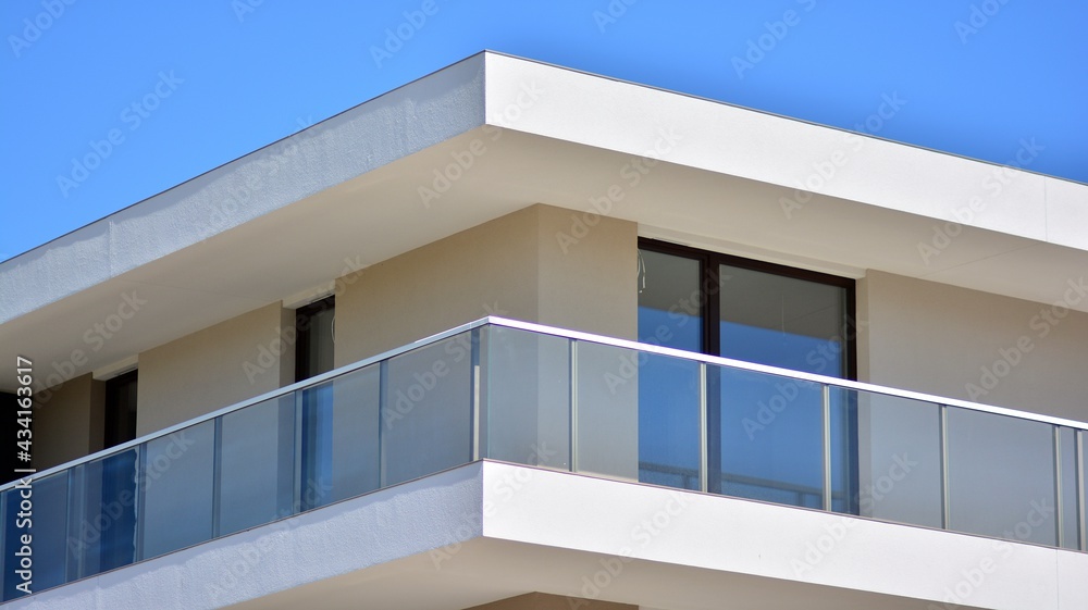 Condominium and apartment building with  symmetrical modern architecture. Detail in modern residenti