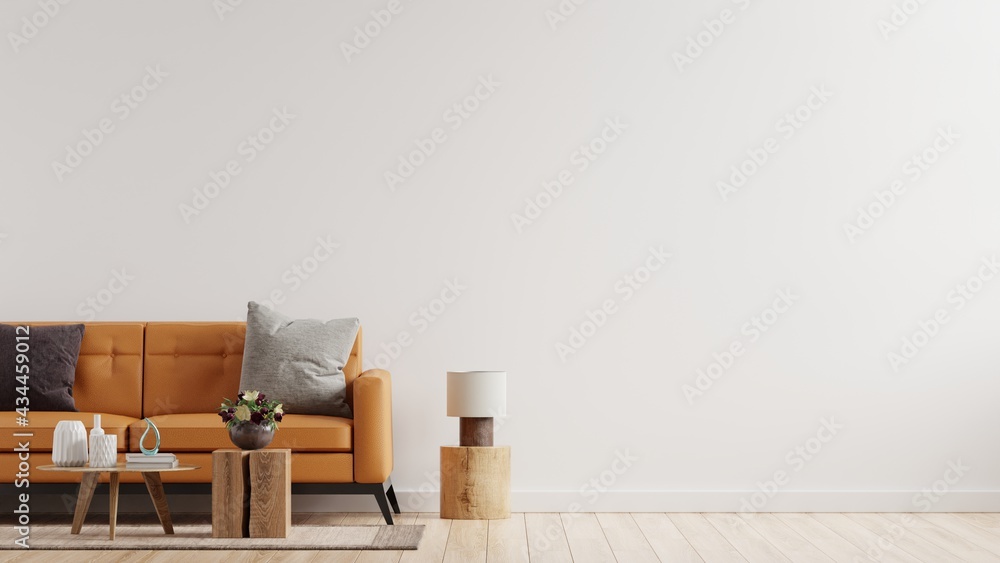 暖色调的客厅内墙模型，白墙背景为皮沙发。