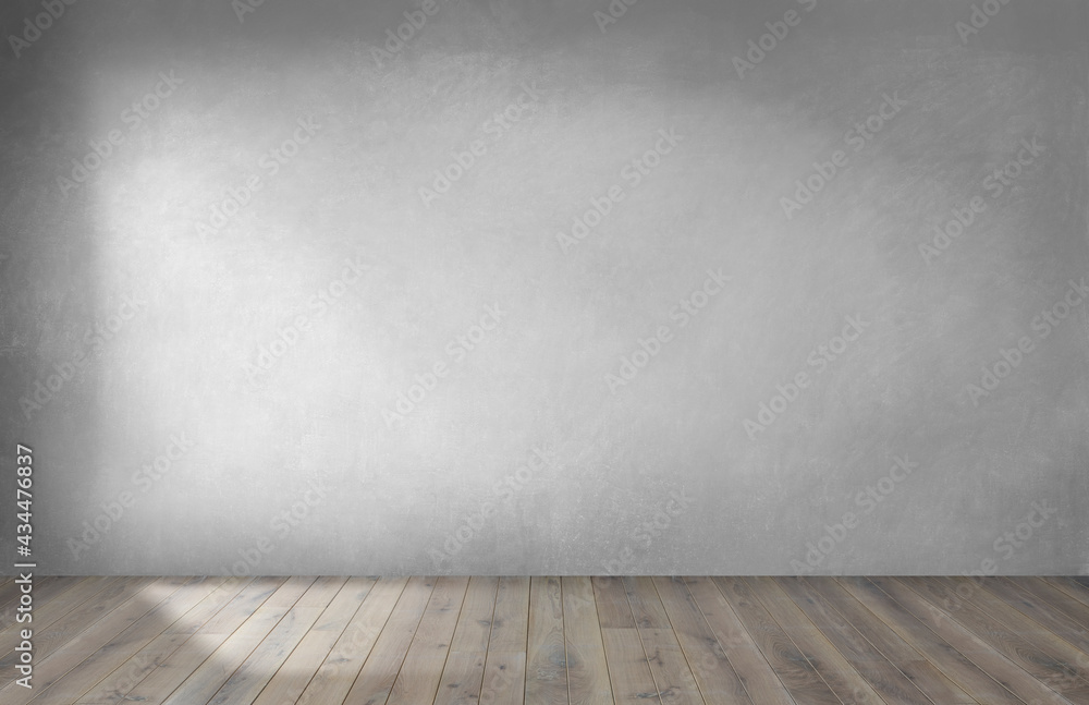 Gray wall in an empty room with a wooden floor
