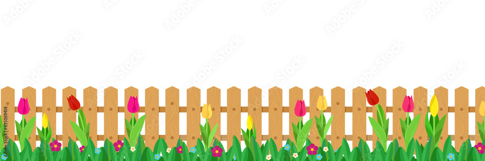 木栅栏前长满鲜花
