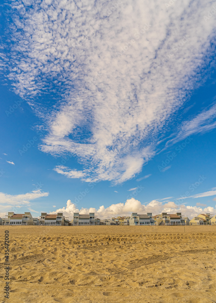 Far Rockaway beach, houses under construction on the background of a beautiful sky with clouds, New 