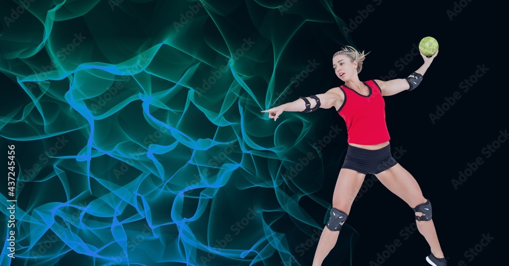 白人女子手球运动员持球的构图，黑色背景上有复制空间