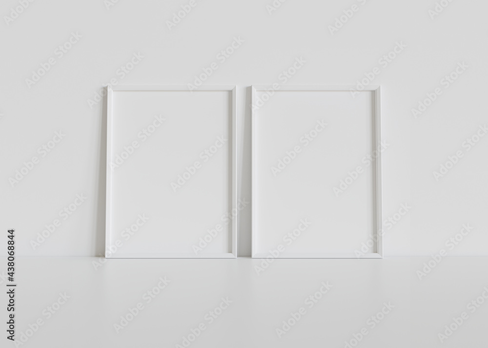 室内模型中，两个白色框架靠在白色地板上。墙上的图片模板3D