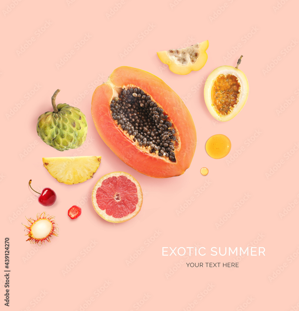 Creative layout made of summer fruits.  Tropical flat lay. Food concept. Papaya, pineapple, grapefru