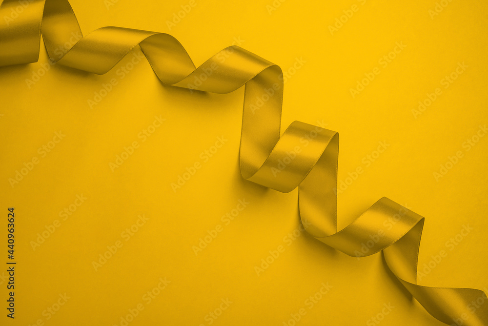Golden yellow ribbon holiday poster background