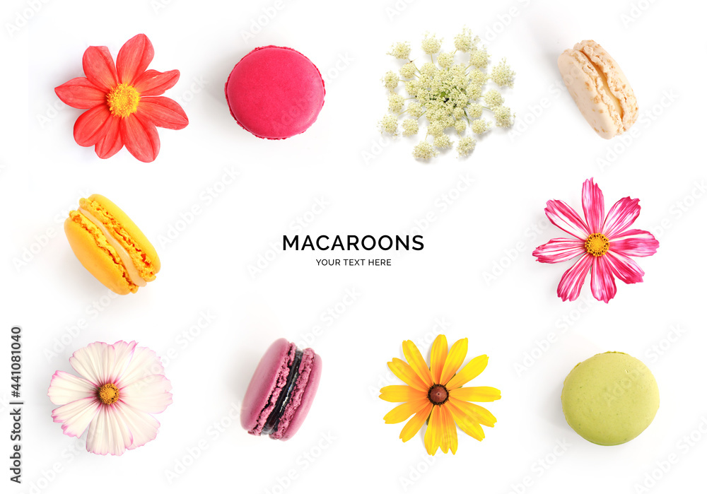 由白色背景上隔离的花朵和马卡龙制成的创意布局。平面布局。食物概念。