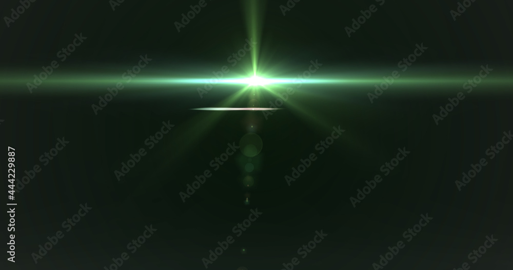 在黑色背景下移动的发光的绿色光点