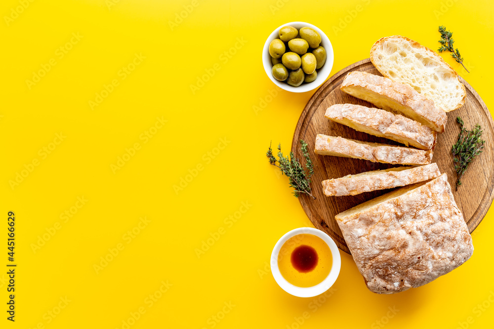 Olive oil on slice of bread with olives. Italian food appetizer