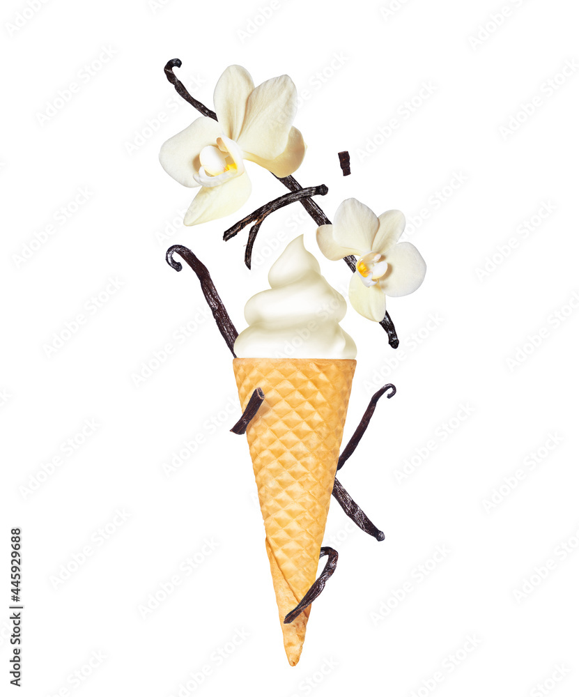 Vanilla soft serve ice cream with vanilla sticks and flowers in wafer cone close-up, isolated on whi